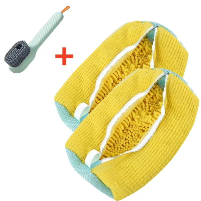 Yellow dog toy with a brush on a white background