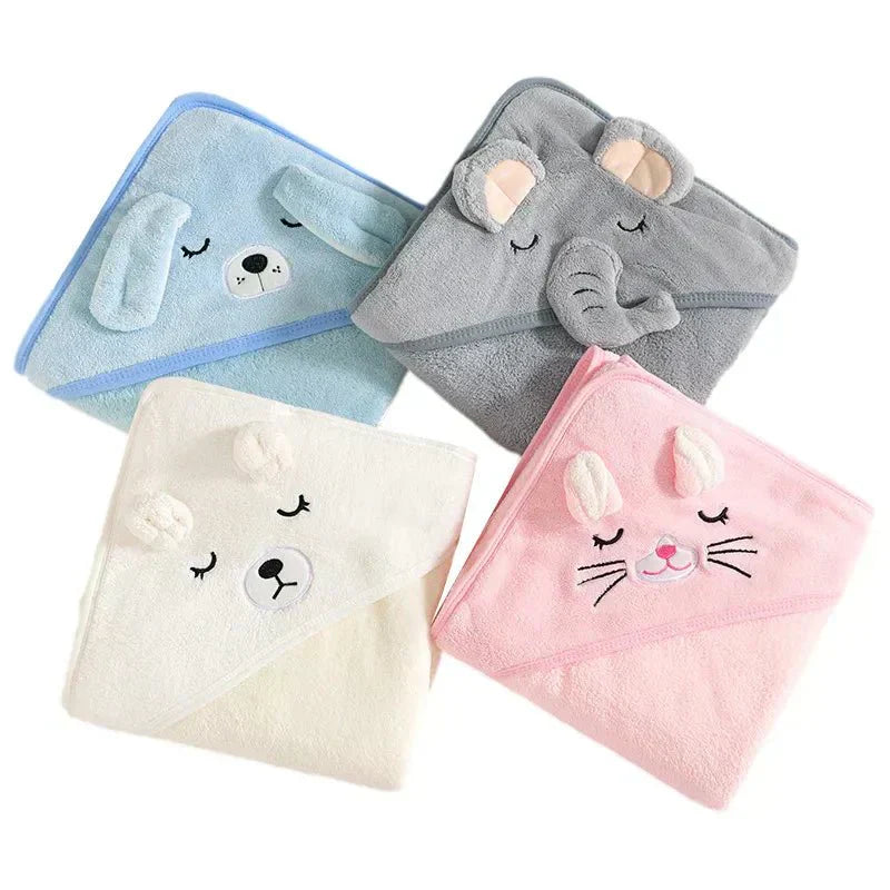 Four animal-themed hooded towels in blue, gray, white, and pink on a white background.